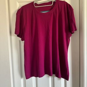 A very pink, Lululemon shirt perfect for any athletic activities